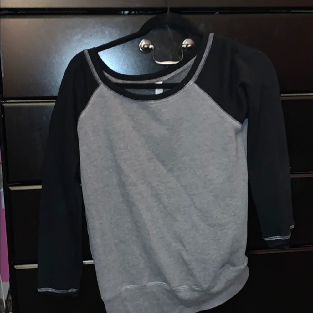 gray sweater with black sleeves